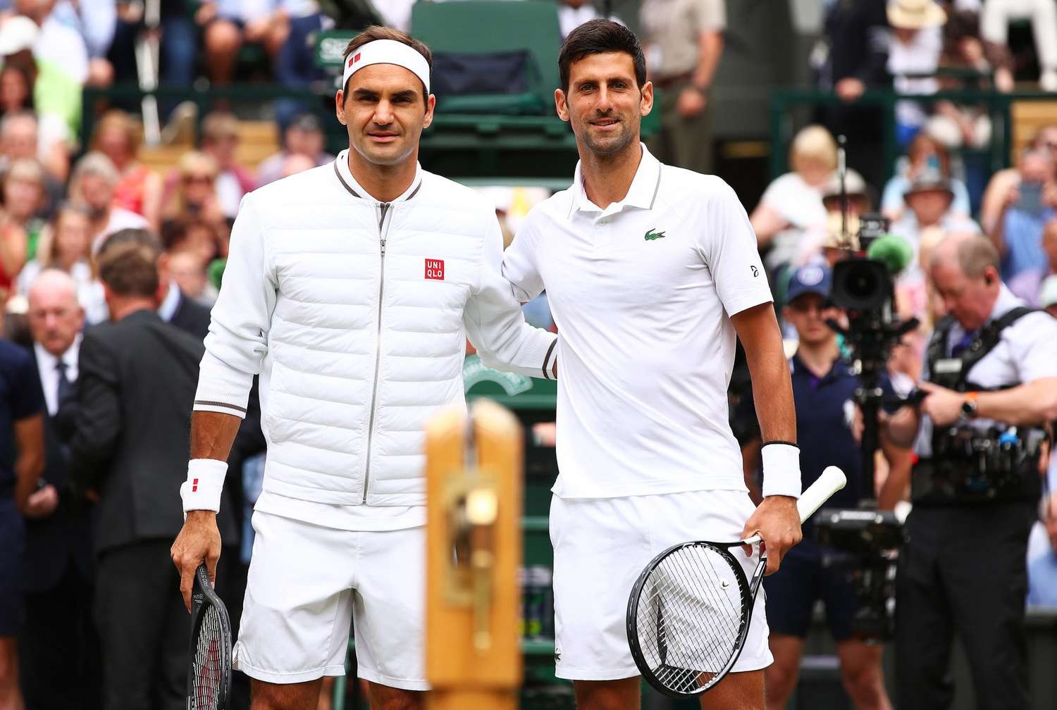 roger-federer-novac-djokovic-1-4878-7215-1721636645-1 Federer (trái) và Djokovic trong trận chung kết Wimbledon 2019, nơi Djokovic thắng sau năm set. Ảnh: Reuters