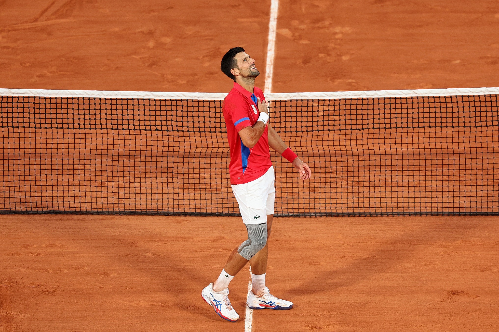 mfile-1764492-2-20240803033533-4418-9755-1722654739-1 Djokovic mừng chiến thắng trước Musetti ở bán kết đơn nam quần vợt Olympic, trên sân Philippe Chatrier, Paris hôm 1/8. Ảnh: Reuters