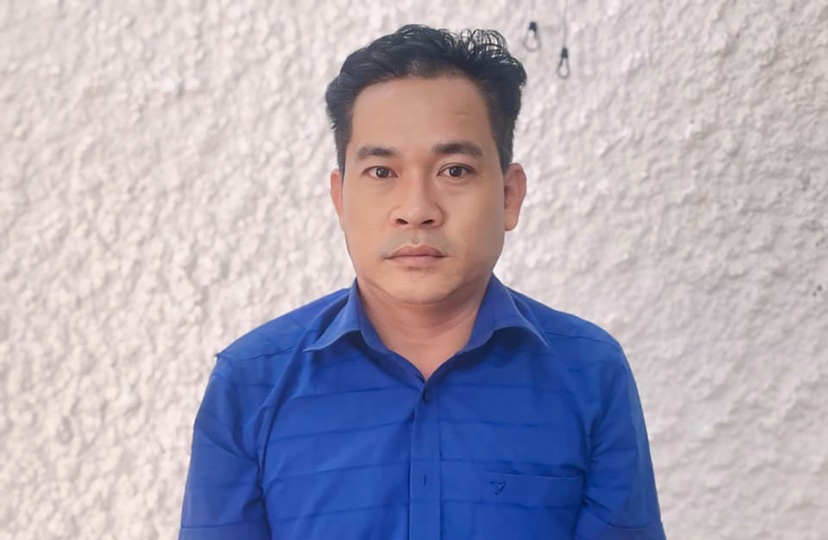Nghi can Quang tại cơ quan điều tra. Ảnh: Công an cung cấp