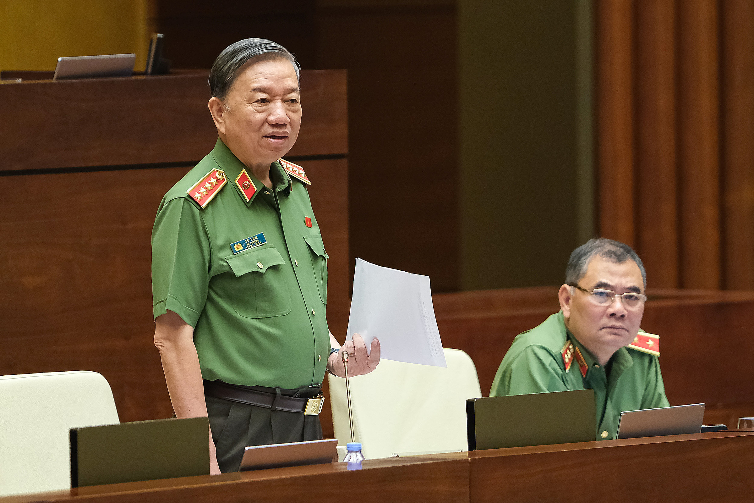 Bộ trưởng Công an Tô Lâm trả lời chất vấn tại phiên họp thứ 14 của Ủy ban Thường vụ Quốc hội, tháng 8/2022. Ảnh: Media Quốc hội