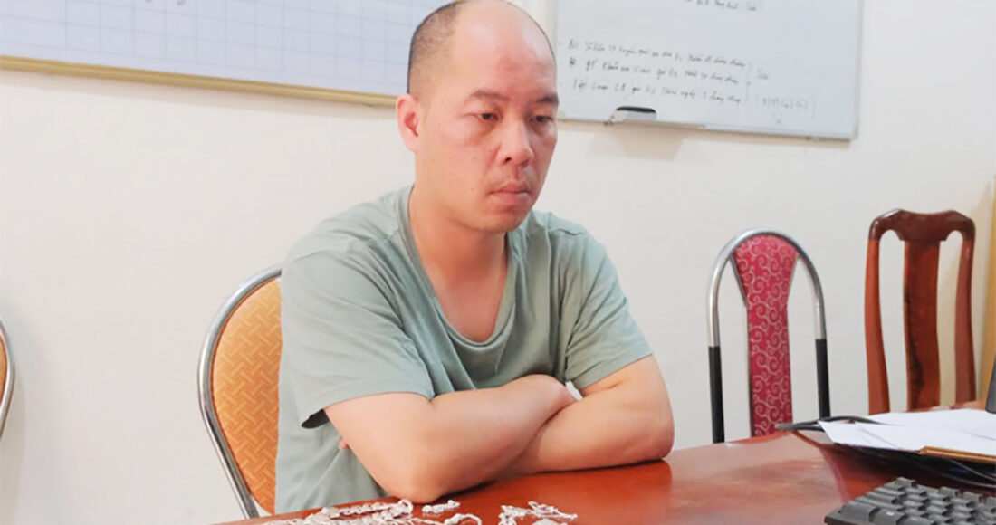 Hoàng Văn Nghĩa tại cơ quan điều tra. Ảnh: Công an cung cấp