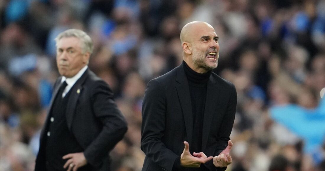 Guarrdiola mừng bàn trong trận Man City 4-0 Real tối 17/5. Ảnh: AP