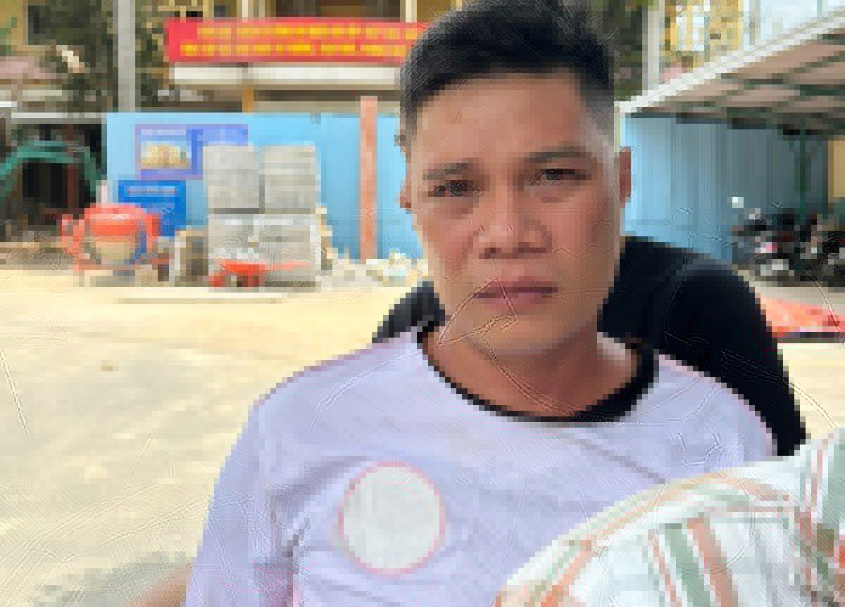 Huy sau khi bị bắt. Ảnh: Nhật Vy