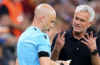 Tình huống trọng tài Anthony Taylor rút thẻ vàng phạt Mourinho trong trận chung kết Europa League trên sân Puskas ở Budapest, Hungary tối 31/5/2023. Ảnh: AP