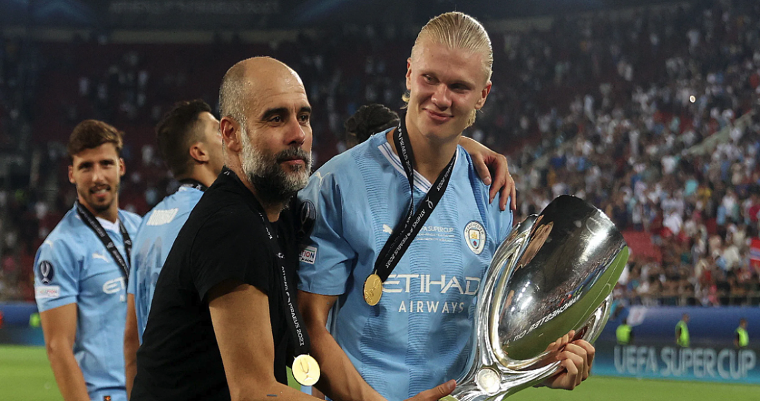 Guardiola và Haaland chia vui sau khi đoạt Siêu Cup châu Âu. Ảnh: Reuters
