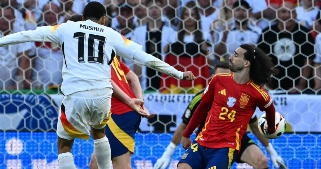 Tình huống Jamal Musiala sút bóng trúng tay Marc Cucurella trong trận Tây Ban Nha - Đức ở tứ kết Euro  tối 5/7. Ảnh: AFP