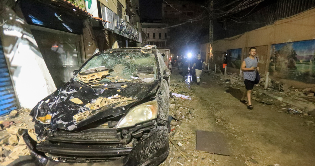Cảnh đổ nát tại hiện trường vụ không kích ở Beirut hôm 30/7. Ảnh: AFP
