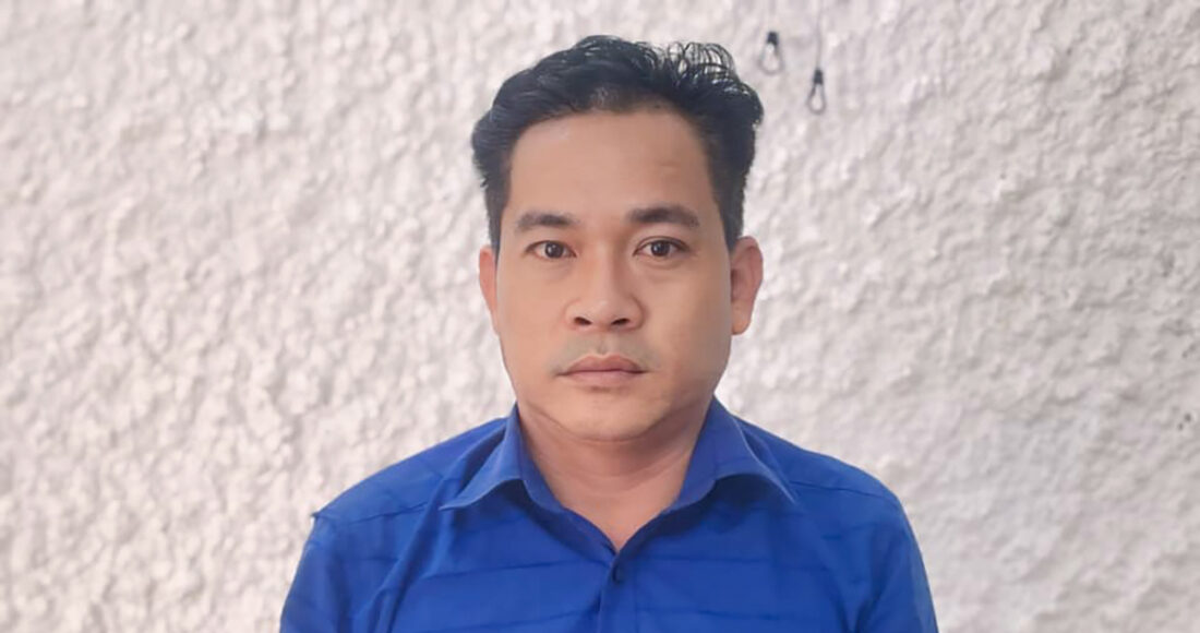 Nghi can Quang tại cơ quan điều tra. Ảnh: Công an cung cấp
