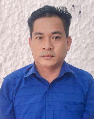 Nghi can Quang tại cơ quan điều tra. Ảnh: Công an cung cấp