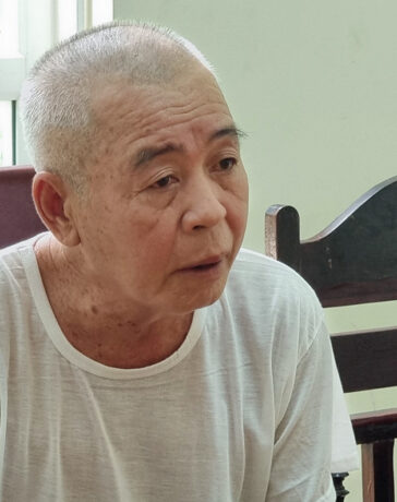 Nghi can Sỏn tại cơ quan điều tra. Ảnh: Hòa Vang
