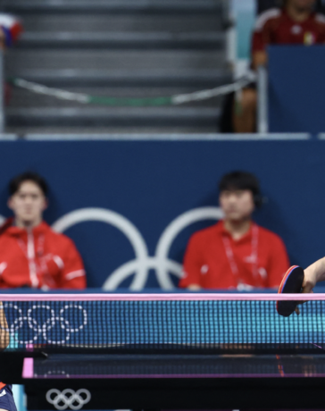 Ri Jong-sik (phải) và Kim Kum-yong (trái) đưa Triều Tiên góp mặt ở chung kết bóng bàn đôi nam nữ Olympic Paris 2024. Ảnh: Reuters
