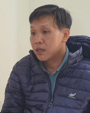 Cù Minh Bình tại cơ quan điều tra. Ảnh: Ngọc Oanh