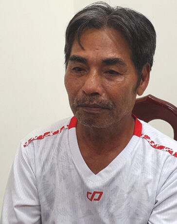Hoàng Thanh Bình tại cơ quan điều tra. Ảnh: Ngọc Oanh