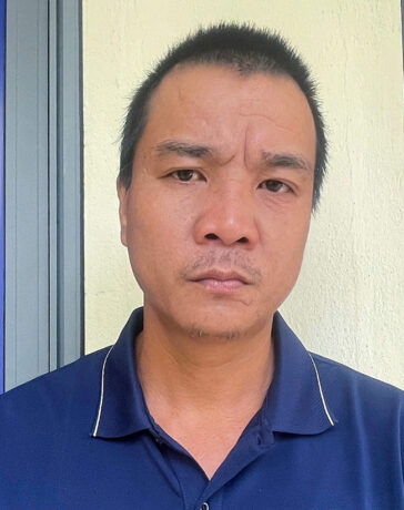 Nghi can Hiệp tại cơ quan điều tra. Ảnh: Hùng Lê
