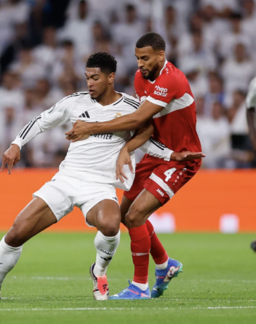Bellingham che bóng trước hậu vệ Josha Vagnoman (số 4) trong trận Real thắng Stuttgart 3-1 ở lượt đầu Champions League trên sân Bernabeu ngày 17/9. Ảnh: realmadrid.com