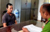 Huy tại cơ quan điều tra. Ảnh: Ngọc Oanh