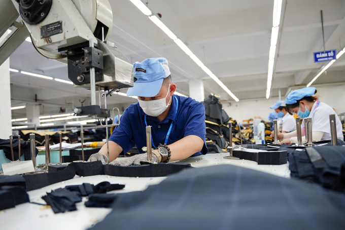 Công nhân làm việc tại công ty dệt may tại Đà Năng, tháng 6/2024. Ảnh: Nguyễn Đông